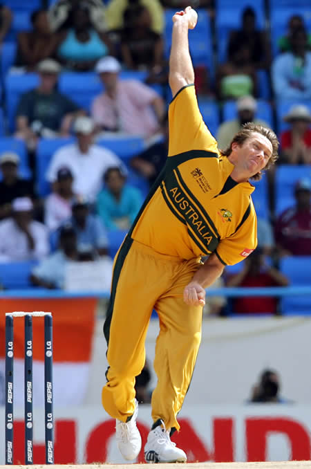 McGrath delivers a ball as he breaks Wasim Akram's World Cup record of 55 wickets