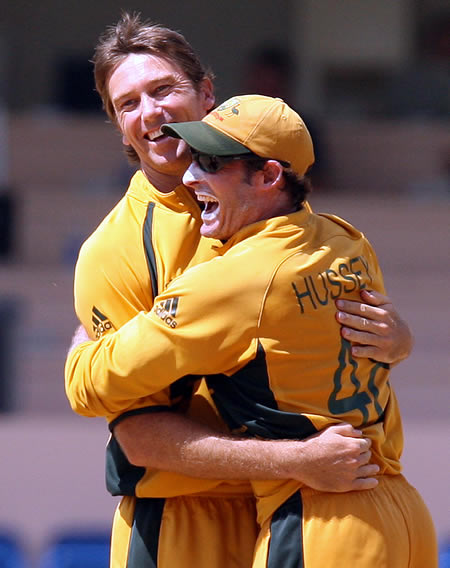 McGrath & Hussey celebrate the wicket of Taylor