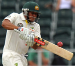 Usman Khawaja pulls during his maiden Test fifty