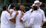 Vernon Philander and the rest celebrate a wicket