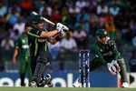 Shane Watson sweeps one for four