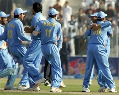 Indian cricketers celebrates after taking a wicket